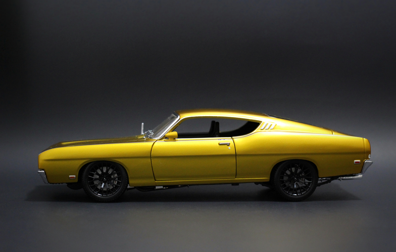 Illustration for article titled Car Week: Custom 1/18 Maisto Ford Torino Talladega Coyote